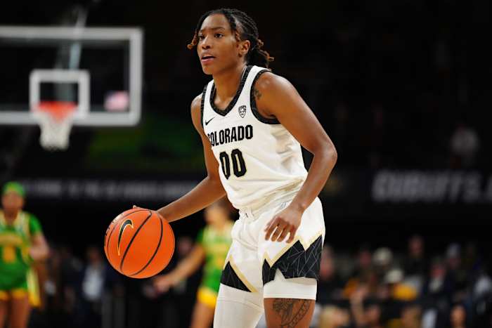 Colorado Buffaloes guard Jaylyn Sherrod (00) controls the ball in the second half against the Oregon Ducks at CU Events Center